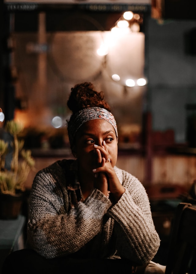 Woman sitting pensively, appearing burdened with heavy thoughts.

The Kristi Jones Podcast -  Forward Focus: Shedding the weight of the past for a new season 