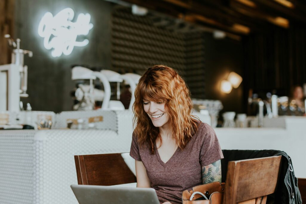 Woman sitting on brown wooden chair while working on a gray laptop

The Kristi Jones Podcast: Top performance tips for business