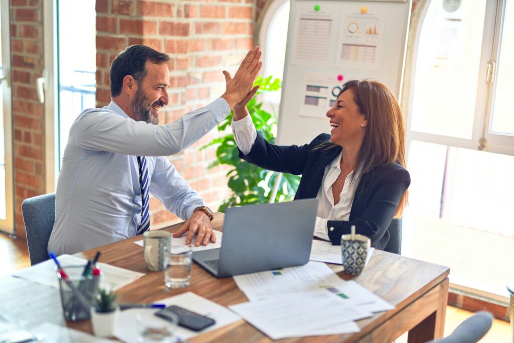 A Man and a Woman doing a celebratory High Five in the office
Rising Above: The High Achievers'Guide to Success Unveiled
The Kristi Jones Show Podcast