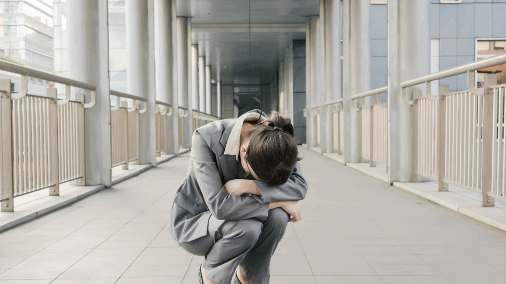 Business woman overwhelmed with Imposter Syndrome. From Imposter to Empowered: Own Your Unique Path, The Kristi Jones Show Podcast