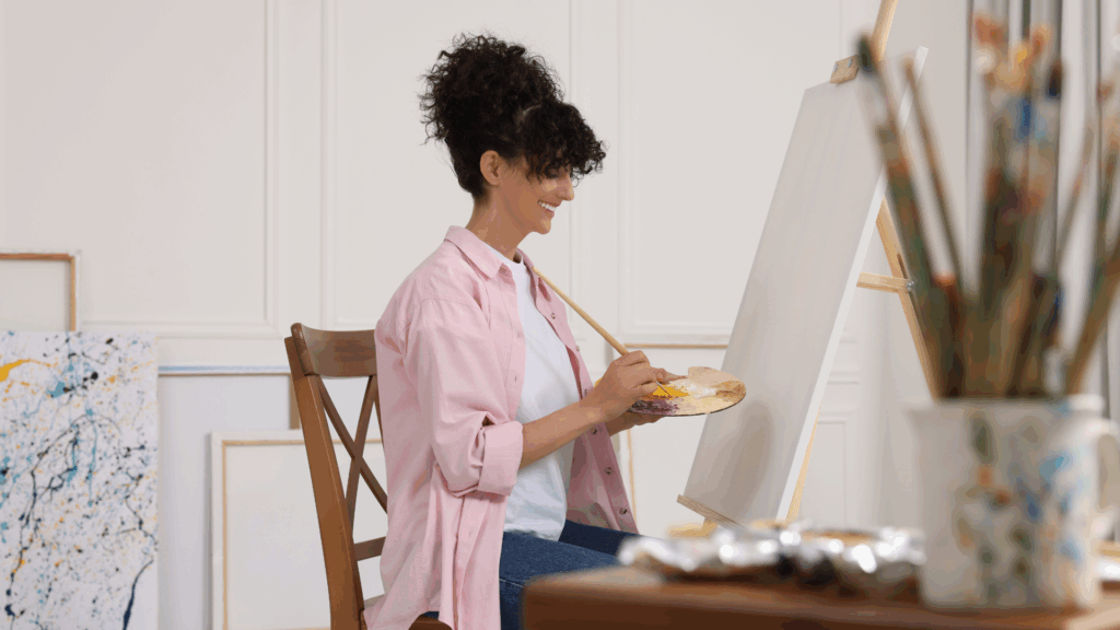 Woman painting and looking fulfilled, Success Isn’t the Problem: Here’s What’s Missing, The Kristi Jones Show Podcast
